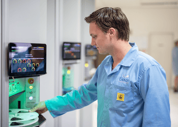 Advanced Manufacturing: A man tending to a machine.